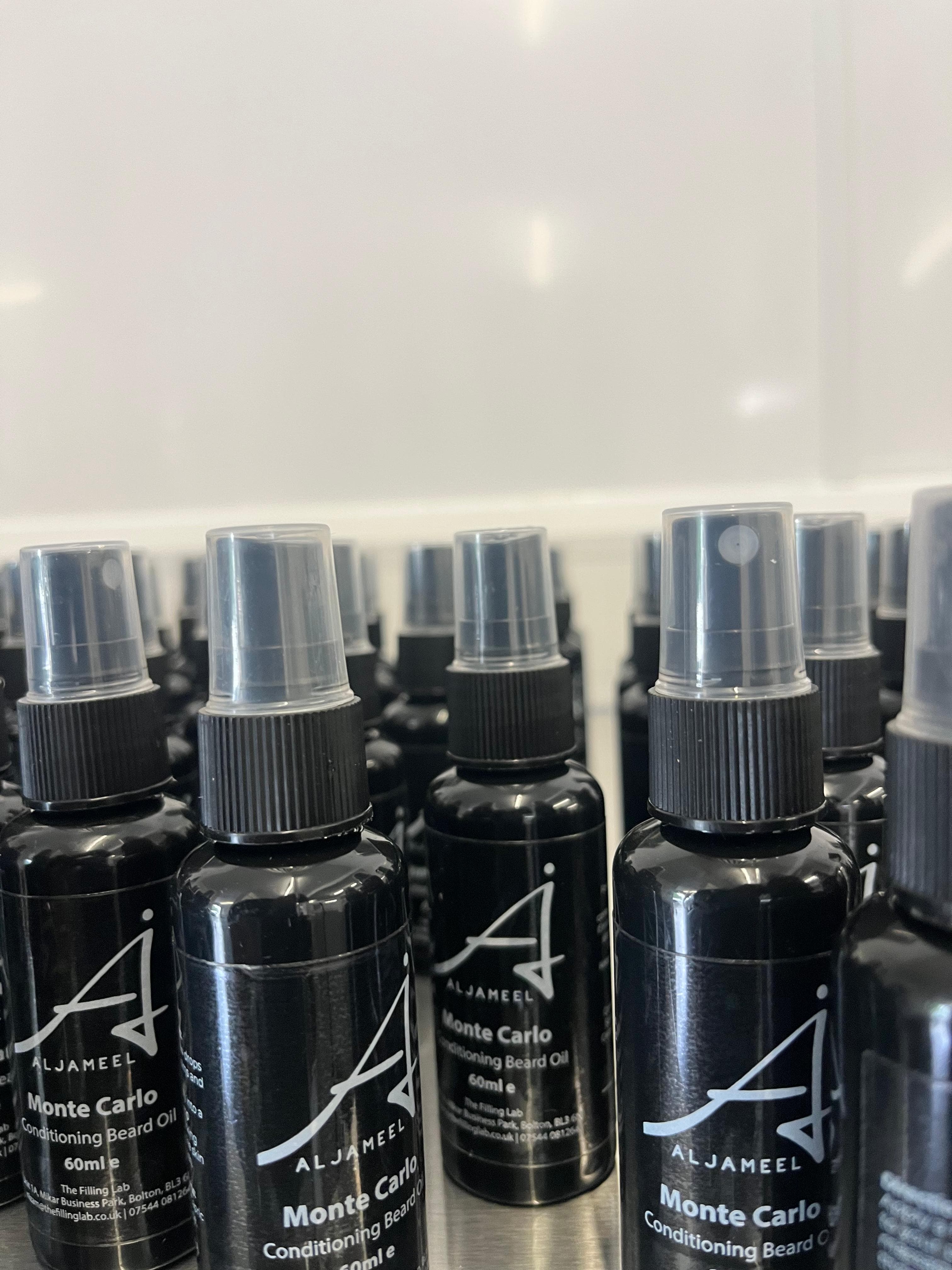 Labelled retail spray bottles from a fragrance run - Cover for luxury fragrance production article.