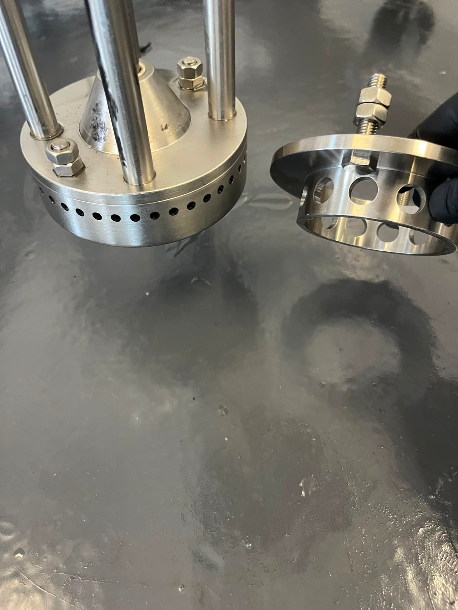High-shear mixer stator heads with precise perforations - Hardware that breaks down polymer lumps at plant scale.